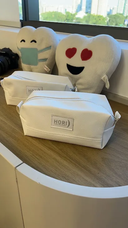 Almofadas em forma de dentinho na recepção